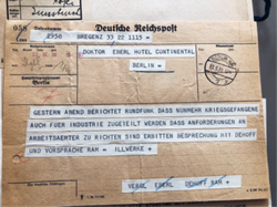 Mit diesem Telegramm wird DDr. Harald Eberl, Vorsitzender des Aufsichtsrats der Vorarlberger Illwerke, aufgefordert, unverzüglich Bruno Dehoff als Leiter des für Vorarlberg zuständigen Arbeitsamtes zu kontaktieren.